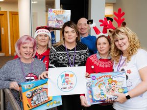 Supporting image for story: Staff waiting to take delivery of toys for our Christmas campaign