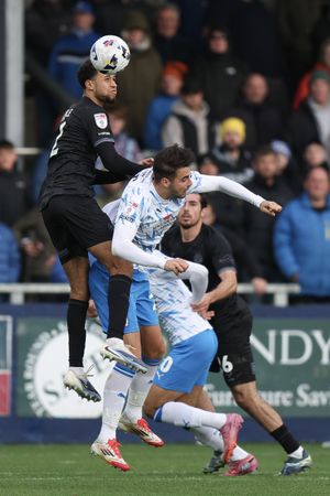 Shrewsbury Town battled hard in tough conditions in Barrow.