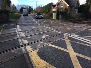Supporting image for story: Road closure and replacement buses as work starts on level crossing near Oswestry