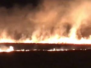 Supporting image for story: Fire sweeps across farm land sending flames into night sky near A449 - WATCH