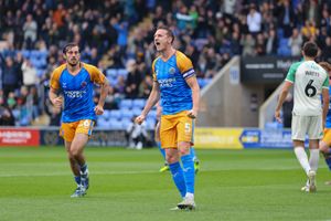 Will Boyle celebrates after scoring against Cambridge United in October