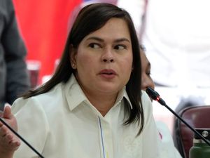 Sara Duterte gestures as she attends a hearing at the House of Representative in Quezon City