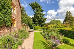 Gardens and outside area at the farmhouse that boasts more than an acre of land, picture: Rightmove and Balfours