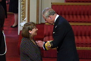 Jean is appointed an MBE by Prince Charles in 2010