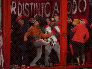 Supporting image for story: Football match called off as rival supporters clash in stadium