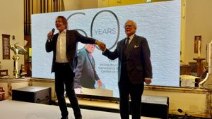 Trevor Workman (R) with Julian Lloyd Webber at celebratory concert.