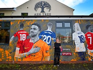 Supporting image for story: Colourful football mural paying tribute to late Wolves star Diogo Jota appears on the side of a Wolverhampton city centre pub