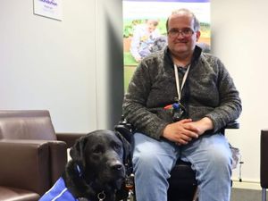 Supporting image for story: Support dog Charlie gives ex-NHS worker his life back – and can even use a credit card