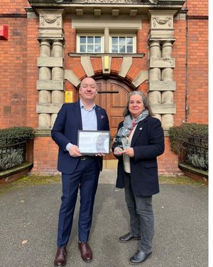 Professor Ken Sloan of Harper Adams University receives the univeristy's SIIC certificate from SCF trustee Mandy Thorn