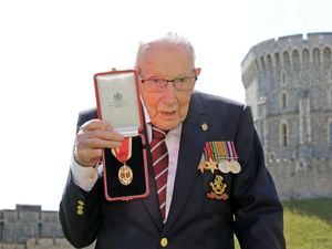 Supporting image for story: ‘Absolutely magnificent day’ as Captain Sir Tom Moore is knighted by Queen