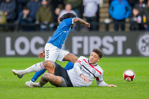 Ryan Winter misses out on a sliding tackle.