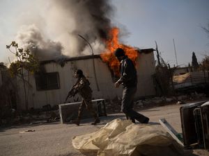 Supporting image for story: Assad says he had no plans to leave Syria but was evacuated by Russians