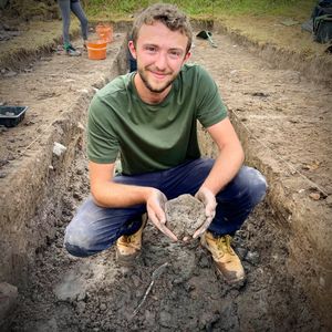 Tom Jenkins with pottery that he found