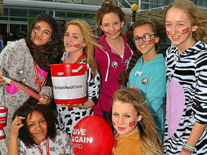 Supporting image for story: Onesie bag packing helps raise funds at Telford Asda