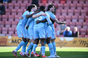 Walsall celebrate Albert Adomah's opener after just four minutes.