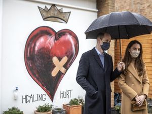 Supporting image for story: William and Kate in front of ‘Healing Hurt’ heart mural – complete with crown