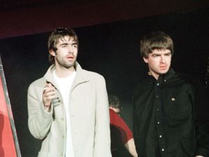 Supporting image for story: Oasis: Mancunian rockers who took on the world before their acrimonious split