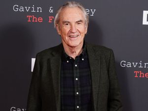 Larry Lamb in front of a dark backdrop featuring the words Gavin And Stacey: The Finale