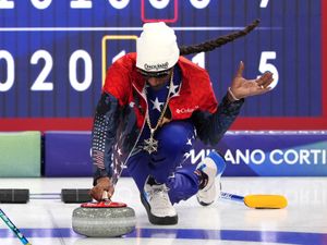 Supporting image for story: Stone cold clean sweep for Snoop Dogg as he tries curling at Winter Olympics