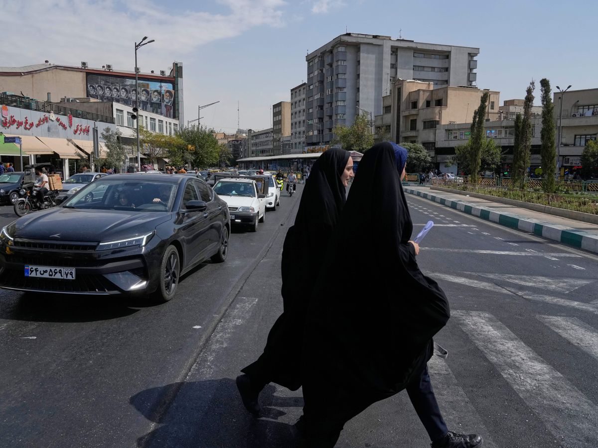 Iran denounces reimposed UN sanctions and considers response
