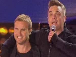 Supporting image for story: Robbie Williams and Gary Barlow perform for Heroes