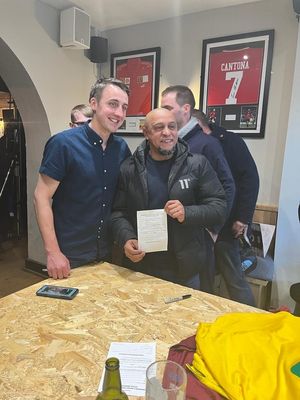 Carlos showing off his Sunday League signing-on form with Matt Brown