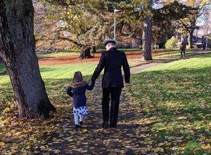 Tom and Georgia Everson walking in the park