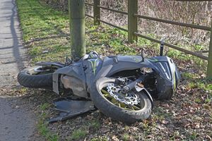 A motorbike could be seen lying on the ground next to Sneyd Lane following the crazh