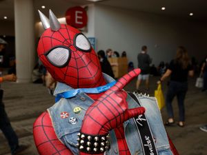 Supporting image for story: In Pictures: Colourful costumes as stars arrive for day one of Comic-Con