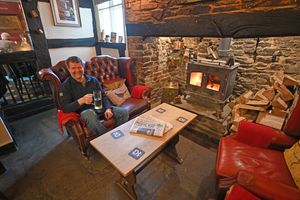 The Chesterfield chairs are a cosy addition to the pub, set next to the fire