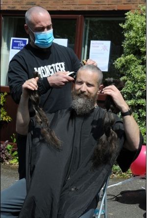 PC Rich Lymer during his haircut