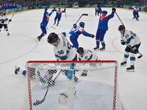 Supporting image for story: Man on run for 16 years arrested after turning up for Olympics ice hockey match
