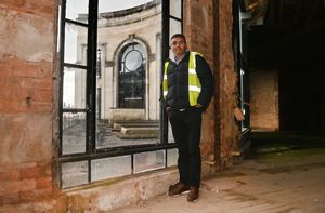 Hiten Raghwani looks through one of the famous arched windows onto a canopy which will soon be removed