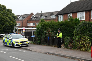 A police car and officer could be seen outside a house on Main Street