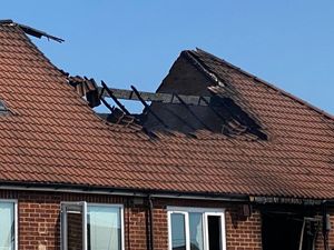 The destroyed roof on the building in Kitts Green, Birmingham.