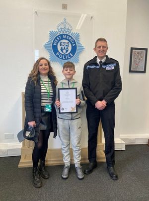 Zac and his mum on Wednesday with the Chief Constable
