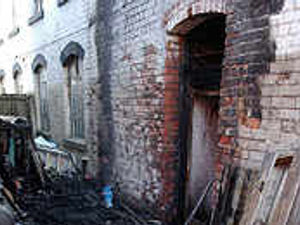 Supporting image for story: Arson fear for shop blaze