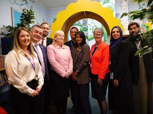 A ribbon cutting was held for the opening of the library with members of the trust, governors, staff and guest author, Serena Patel