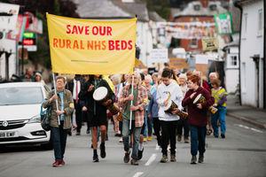 Campaigners and residents have marched in Bishop's Castle calling for health bosses to re-open inpatient beds at their hospital.