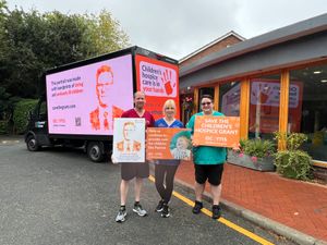 Supporting image for story: Why portrait of PM’s face made from handprints of dying and seriously ill children is on a truck touring the Black Country