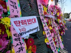 Supporting image for story: South Koreans turn to flower wreaths and K-pop light sticks as political symbols