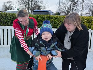 Young Oliver enjoying the festive event.
