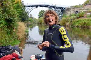 Kevin Brady at the Iron Bridge as he attempts to become the first person to swim the length of the River Severn