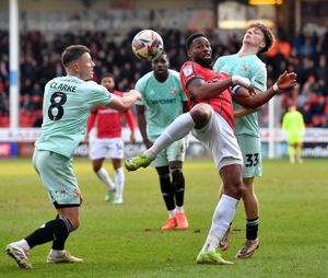 Jamille Matt tussles for the ball.