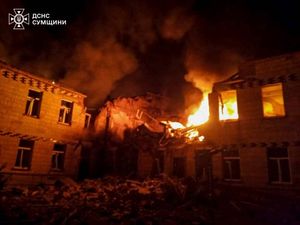 Flames and smoke engulf a building after a Russian attack