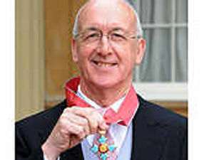 Supporting image for story: Top businessman receives CBE