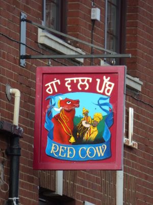 The Red Cow is one of many desi pubs in the region to have a different sign outside the pub. Photo: Elliott Brown
