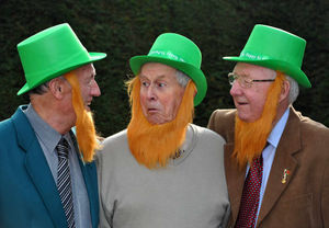 Dora's friends Phil Stokes, Bill Marshall, and Don Mills dress up for St Patrick's Day to celebrate her birthday