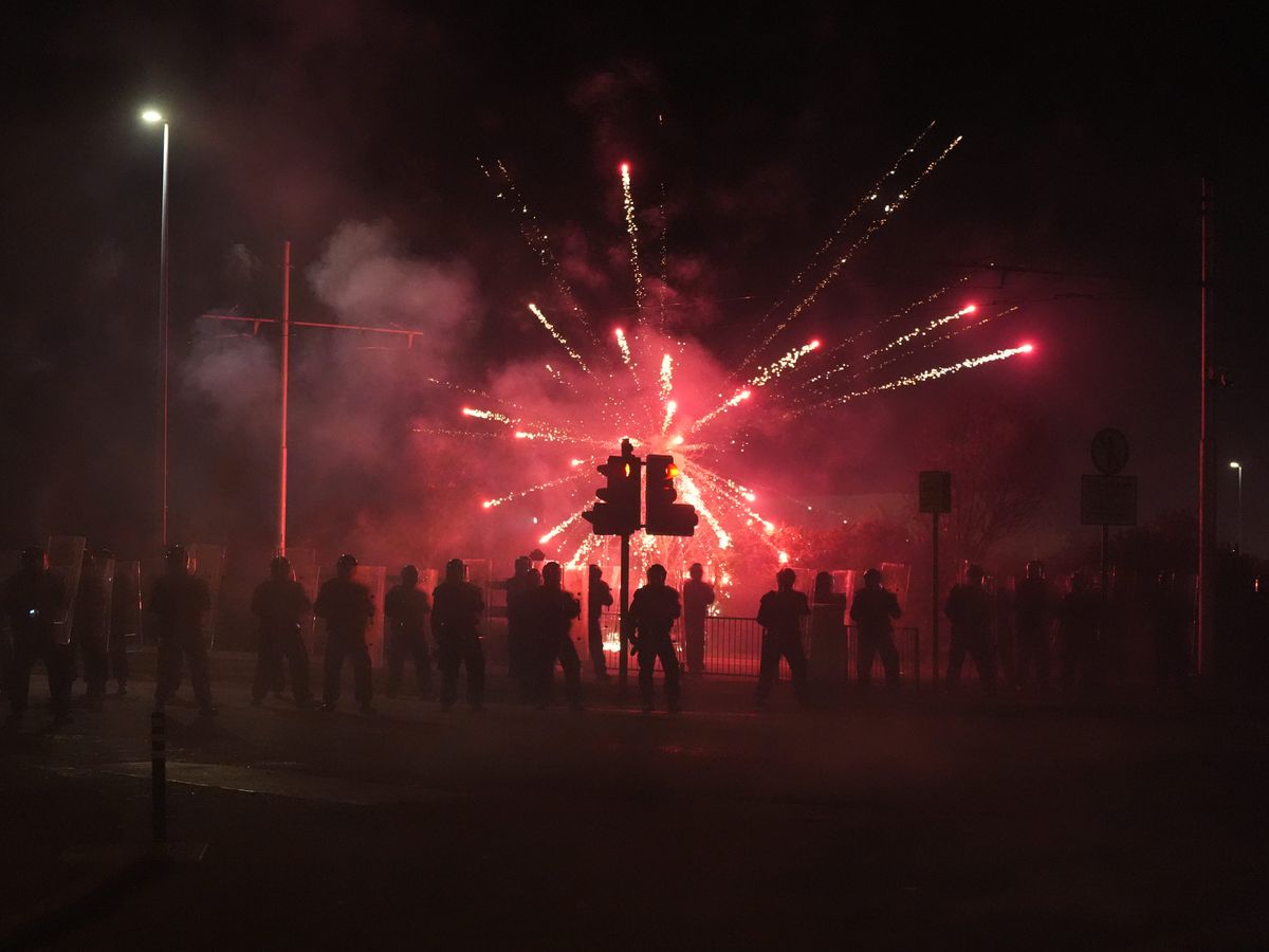 Fireworks and stones thrown at police for second night at asylum seeker hotel