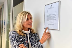 Dawn Haywood with the letter sent to them from Elizabeth Berridge acknowledging their work during lockdown